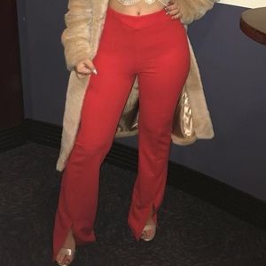 Red pants with slight flared bottom. Size small. Great condition.